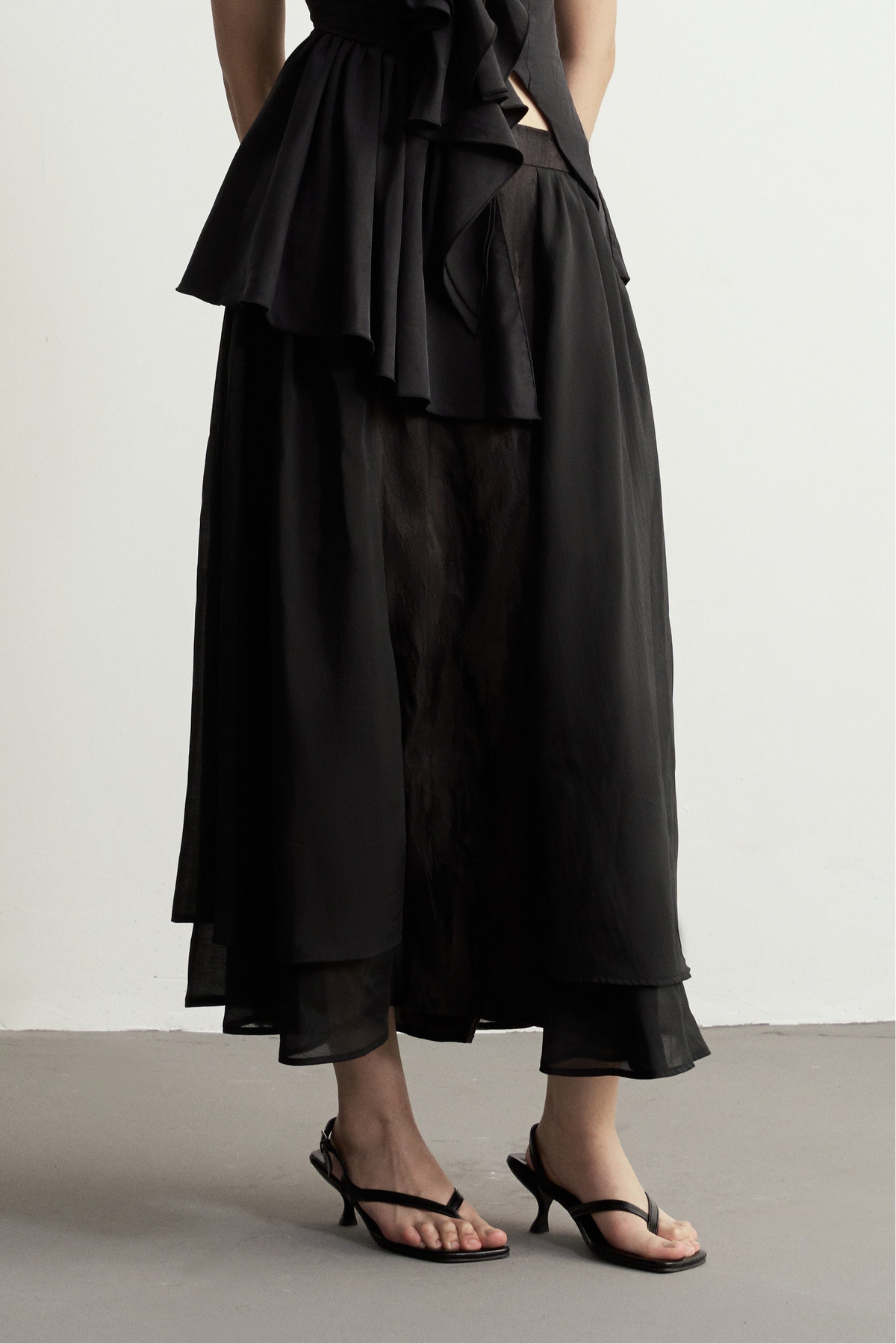 BLACK JACQUARD FLARED SKIRT WITH SHEER PANELS